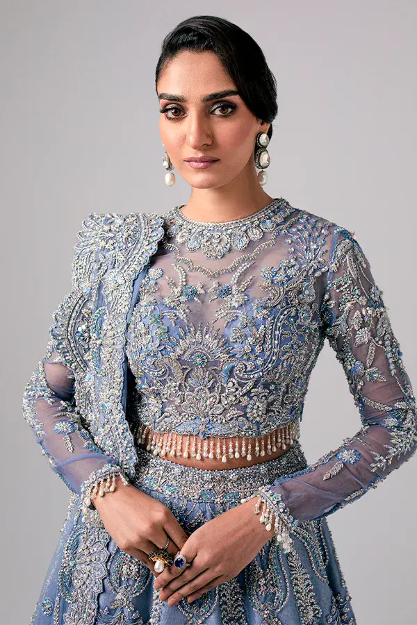 Aarzu sky blue organza bridal lehenga choli by Nyra Couture, full length front view