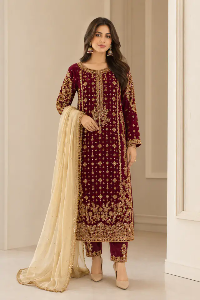 Monam Luxe Suroor burgundy tassel silk three-piece with gold embroidery and a cream net dupatta, full-length front view