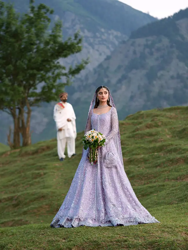 Sahar lilac bridal gown and lehenga, full length front view in the mountains