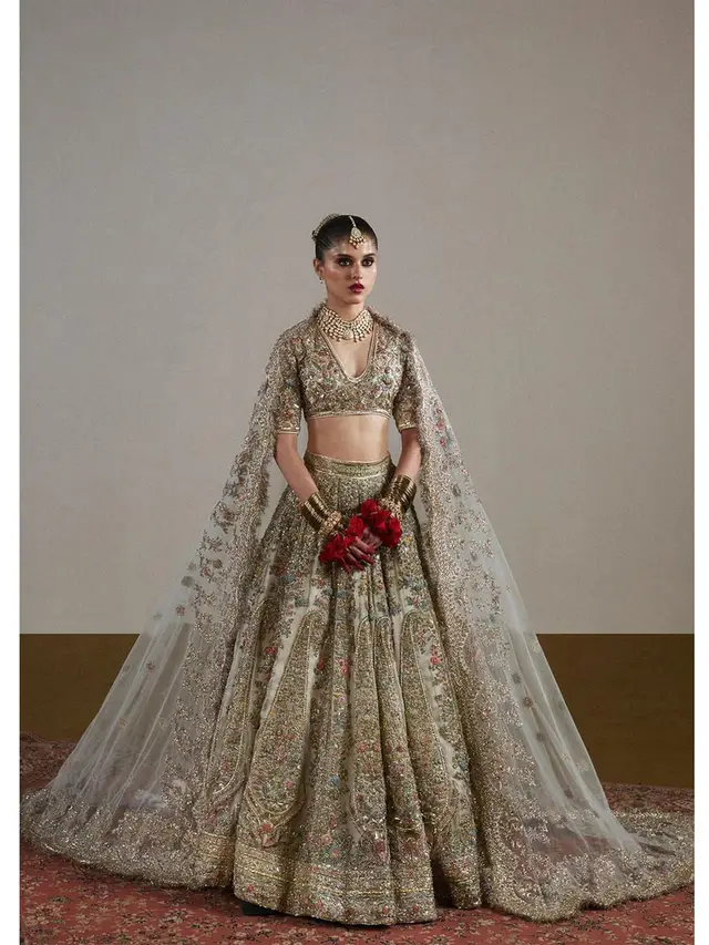 Sawara ivory bridal lehenga choli with net dupatta, full length front view